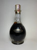 Mohawk Four Compartment Liqueur Bottle (Crème de Banane - Blackberry Liqueur - Crème de Menthe - Crème de Cacao) 1950s, (Various ABV, 94.6cl)