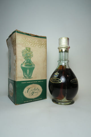 Mohawk Four Compartment Liqueur Bottle (Crème de Banane - Blackberry Liqueur - Crème de Menthe - Crème de Cacao) 1950s, (Various ABV, 94.6cl)